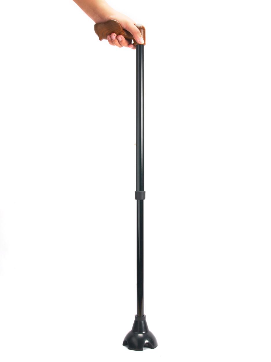 The cane stands on its own with the elastic quad base