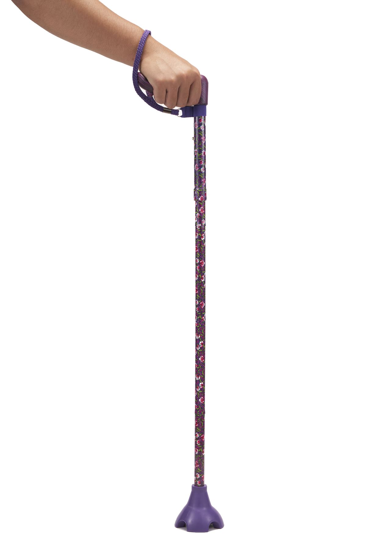 The cane stands on its own with the elastic quad base